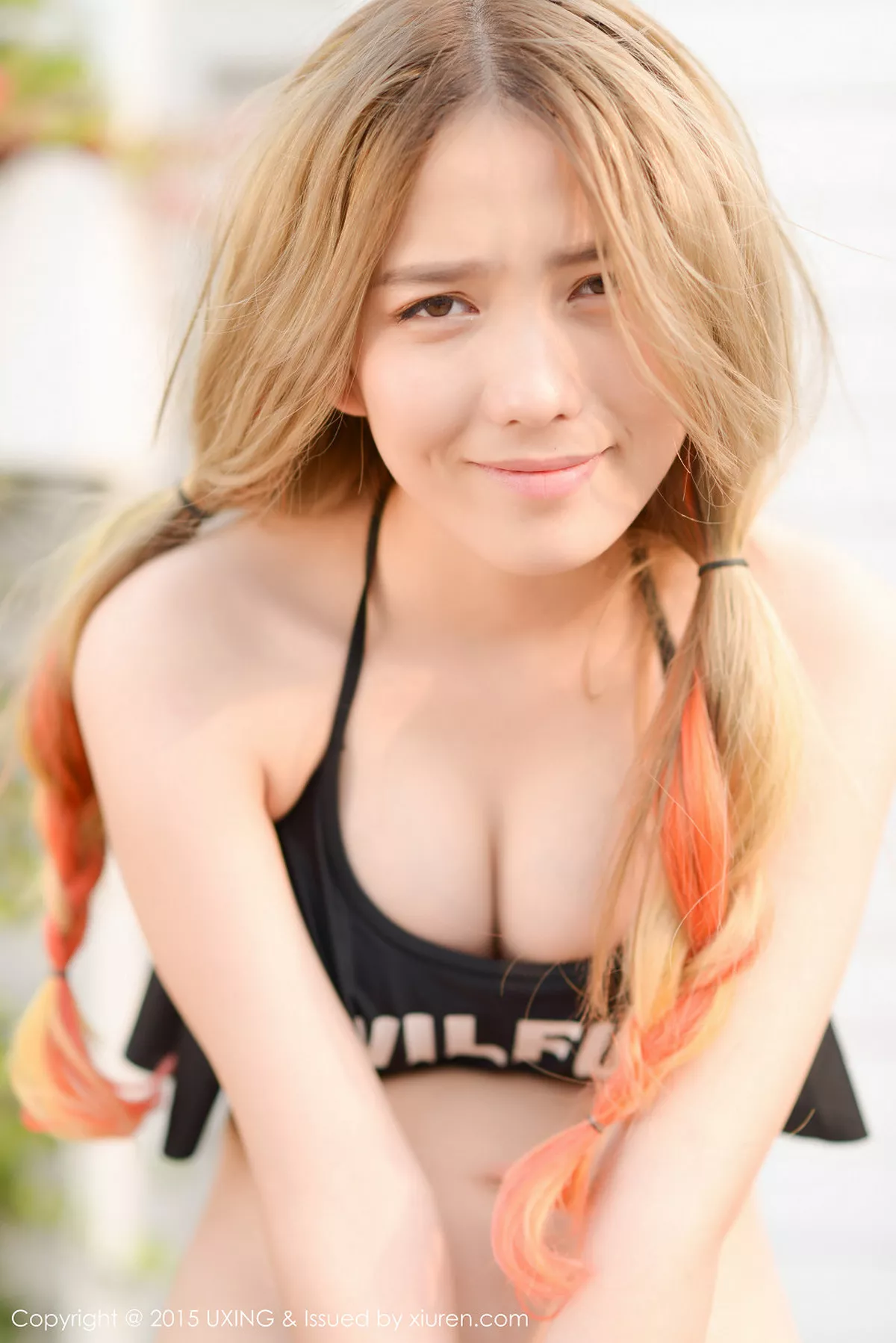 秀人集.com_[UXING优星馆]Vol.026_嫩模懒桃子黑色比基尼秀完美身材性感美胸写真50P